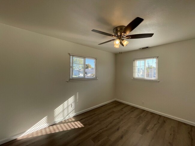 Building Photo - Centrally Located, Nicely Updated Throughout, Large Backyard, Attached Garage