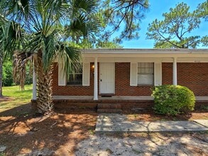 Building Photo - 2 bedroom 1 bath available for rent ~ trash and lawn care included!