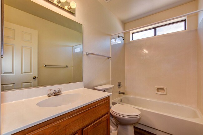 Building Photo - Three bedroom, two bath, two car garage in...