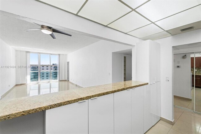 Building Photo - 19380 Collins Ave