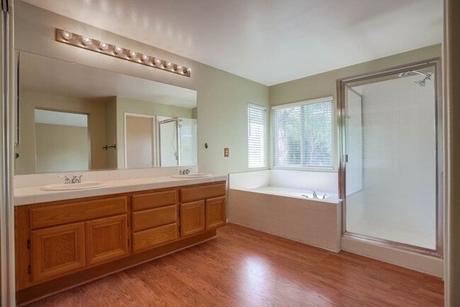 Building Photo - Available Now!! Spacious 4 Bedroom Plus a ...