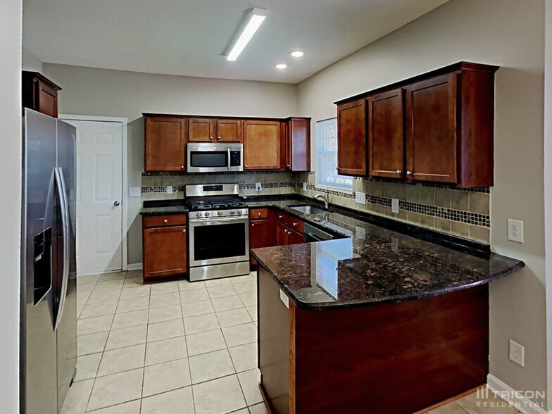 Building Photo - 1017 Woodland Pointe Dr