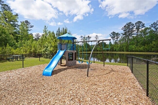 Building Photo - Highly Desirable 4 Bedroom Home with Serene Cul-de-Sac Living in Watergrass Community