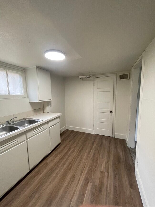 Kictehn - not pictured is a refrigerator that will be included - 903 S 19th Ave