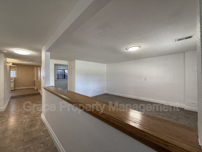 Building Photo - 1149 E 58th Ave