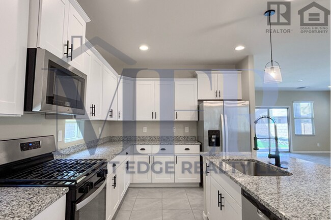 Building Photo - 4Bed/3Bath Home at I10/Wilmot Rd! $199 MOV...