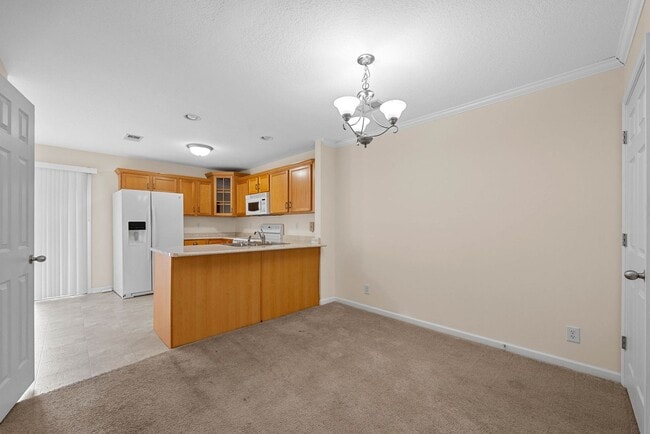 Building Photo - Large 2 Bedroom 2 1/2 Bath Dog Friendly Condo For Rent!