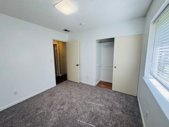 Building Photo - Don’t Judge the Outside—This 3BR Stuns Inside