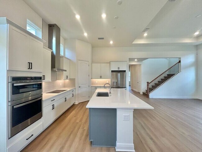 Building Photo - Gorgeous 4/3 Residence with a Private Back Lanai and a 3 Car Garage in the Delightful Laureate Pa...