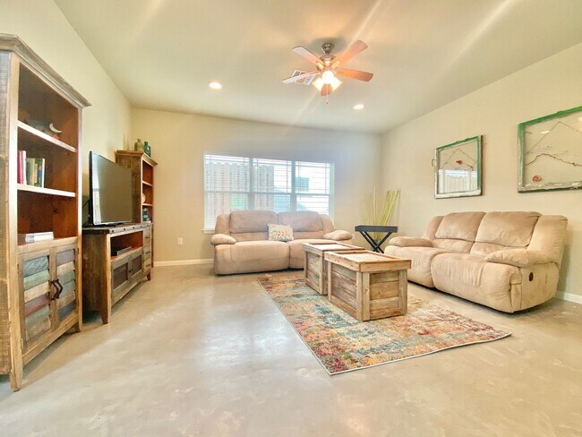 Building Photo - This charming two-story home, built in 2018, offers a spacious open floor plan perfect for casual...