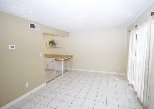 Building Photo - 2-Bedroom Waterfront Townhouse with Community Pool – Available 11/26