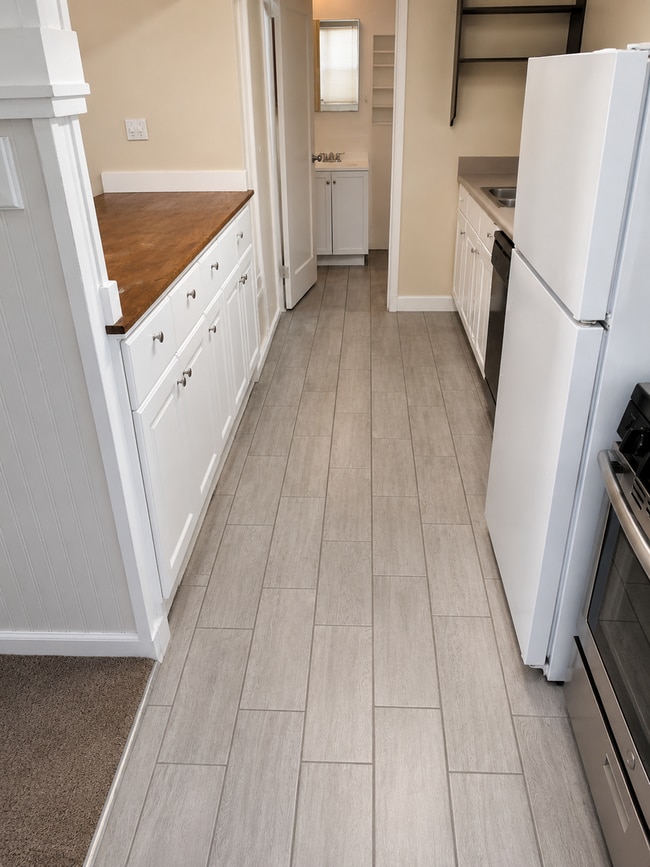 Building Photo - Available 6/25. Private rear unit, 5-minute walk to Cal Poly, parking included but no car needed.