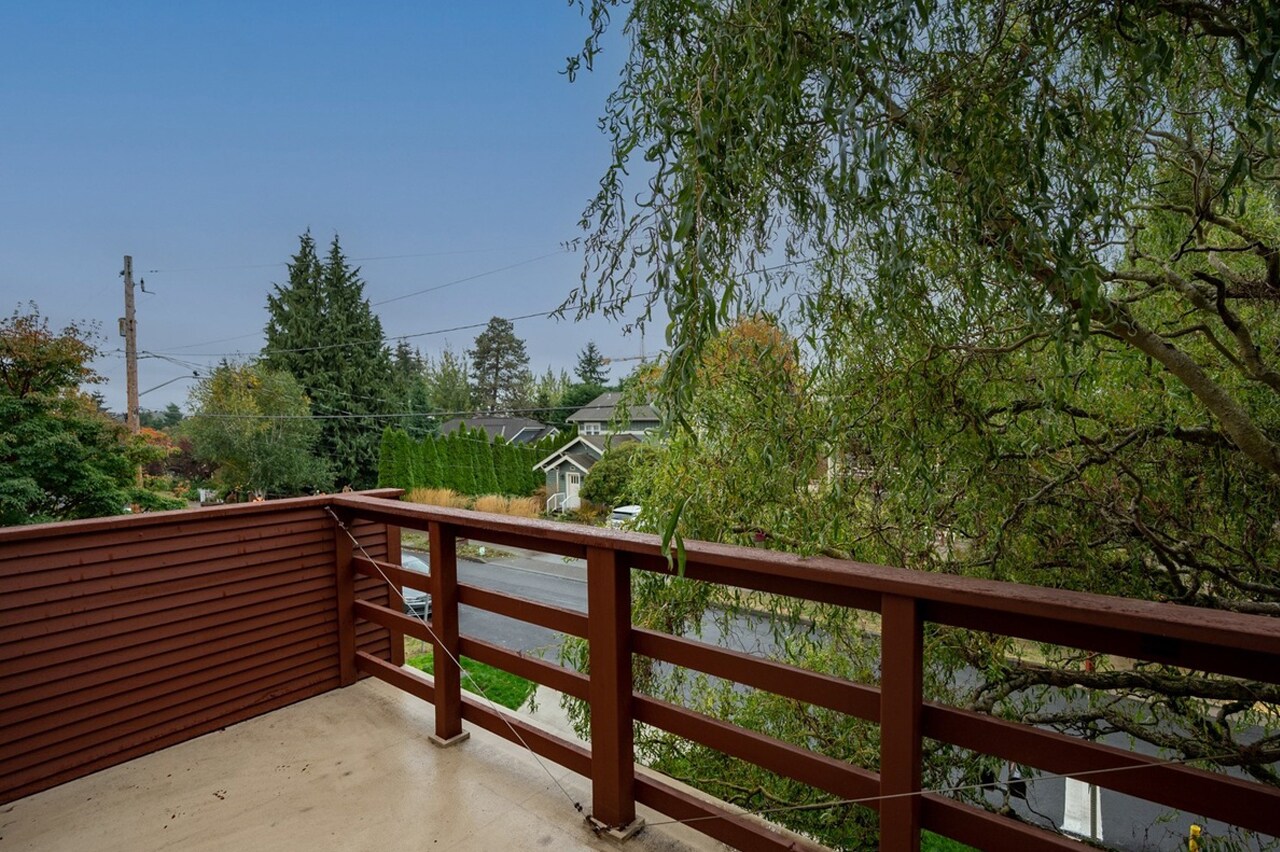 Private 2nd floor balcony. - 8752 Dayton Ave N
