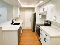Building Photo - Fully Remodeled Second Story Condo with La...