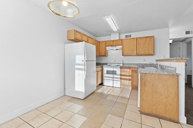 Building Photo - Spacious 2-Bedroom Condo with Fireplace – ...