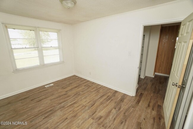 Building Photo - Lawn Care Included in Jville City Limits!