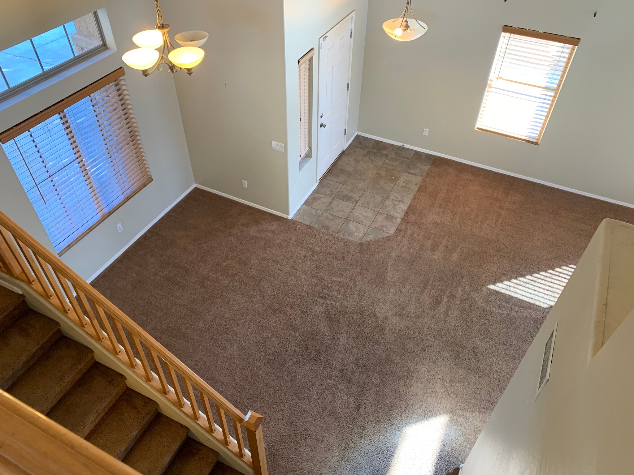 Spacious 4-bedroom, 2-bath home with soaring ceilings, gourmet kitchen, and a heated self-cleaning p - 16426 N 152nd Ln