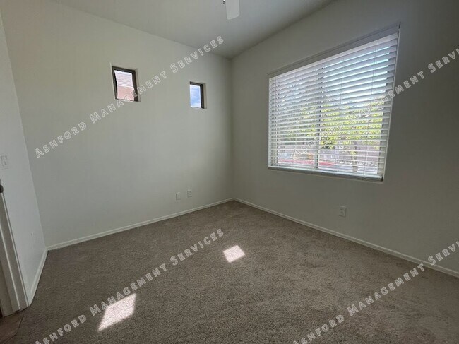 Building Photo - Well-Priced 3-Bedroom Plus Den in Gated Ru...