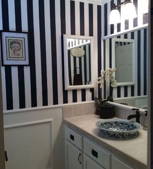 Building Photo - Stunning 2-story home offering 3 bedrooms, 2.5 bathrooms, with Pool