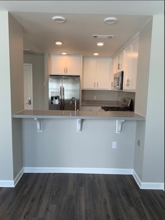 Kitchen View from Living Room - Novato Village Senior Apartments