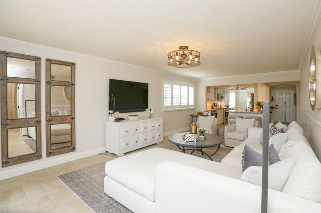 Building Photo - Live the Naples Lifestyle – Elegant 2BR/2B...