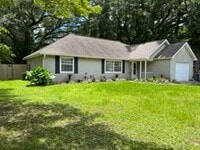Building Photo - 3 bed 2 bath house, 1-car garage and fenced-in yard! Available May 15