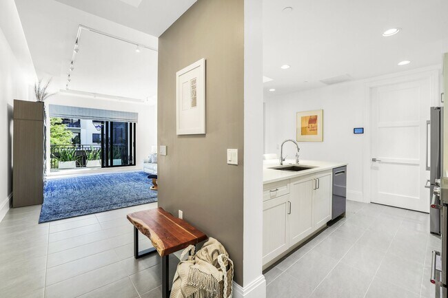 Building Photo - Luxury Living Meets Prime Location! Naples Square 2/2 Condo with Expansive Terrace