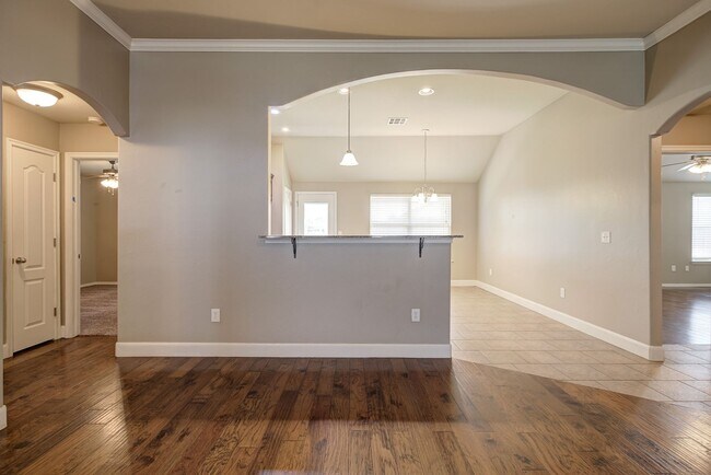 Building Photo - Spacious 4-Bedroom Home with Modern Upgrad...