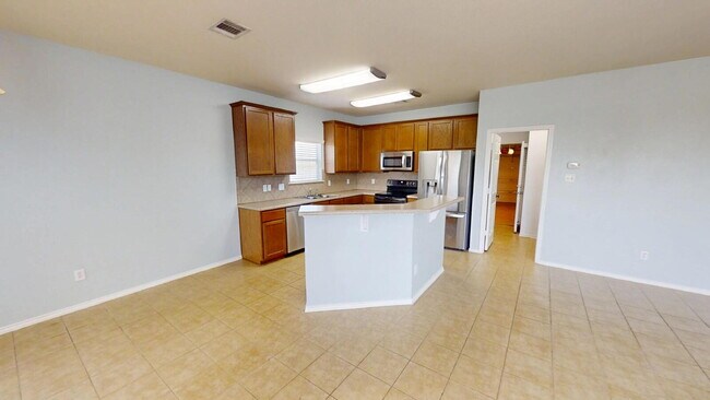 Building Photo - "Spacious 5-Bedroom Oasis with Pool on Gri...