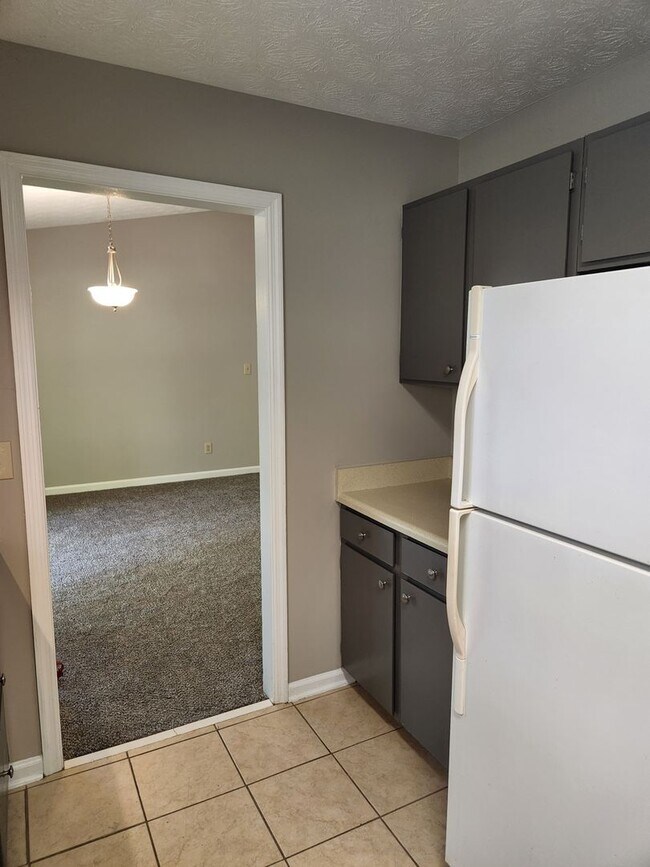 Building Photo - The Best of North Metro Living without the Hustle Bustle