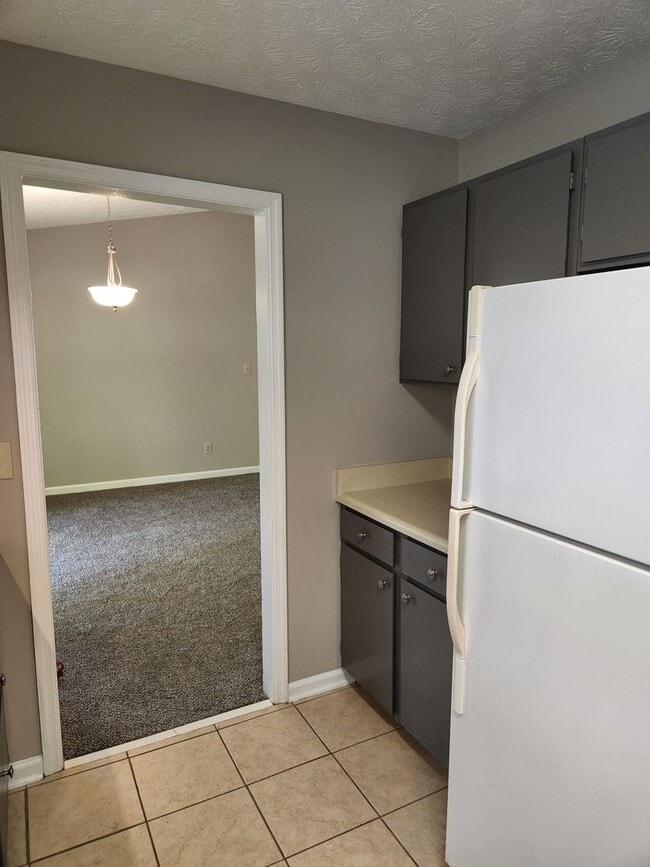 Building Photo - The Best of North Metro Living without the...