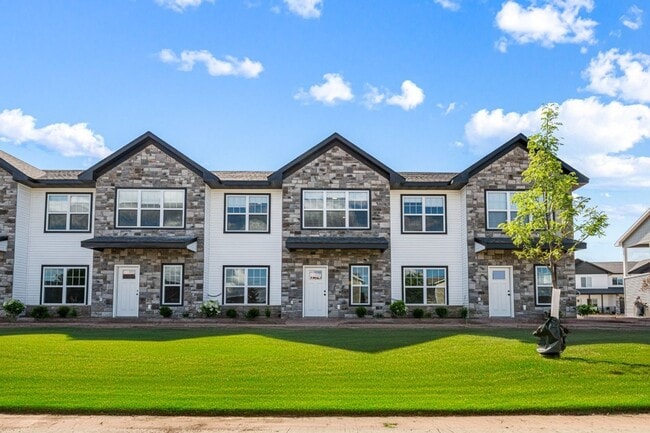 Building Photo - New 3 Bed Townhome with Covered Deck and Oversized Garage!