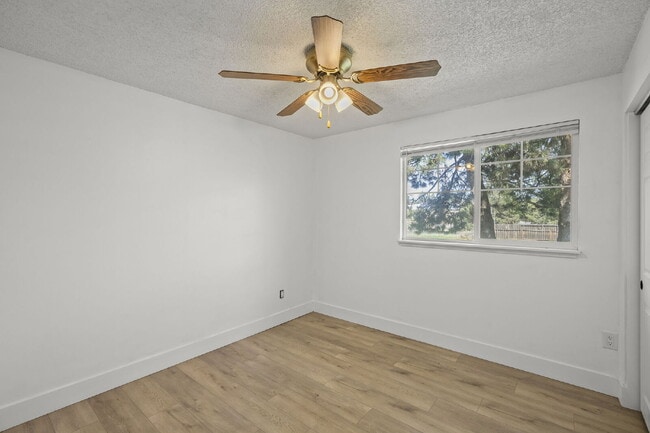 Building Photo - Charming 3-Bedroom Bend Home on 1/2 Acre with Expansive Yard, Mature Trees & Covered RV/Boat Storage