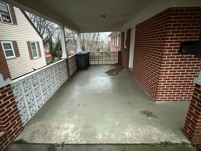 Building Photo - Updated 4BR Home with Finished Basement & Level Yard