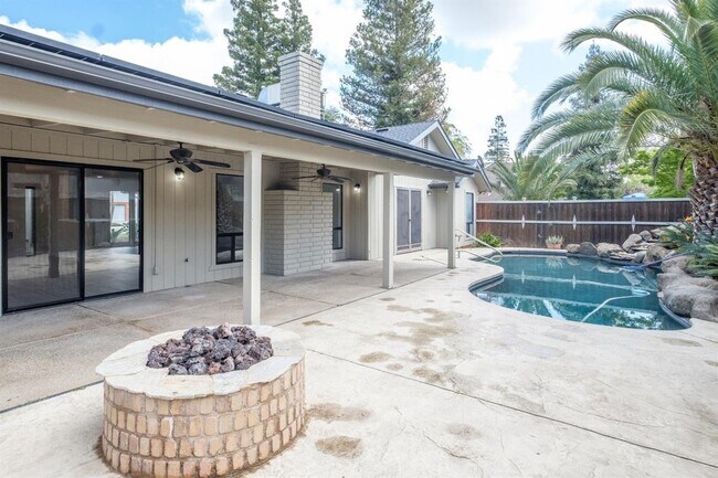 Building Photo - Drench Yourself in Luxury: 3-Bedroom Corner Oasis with a Sparkling Pool!