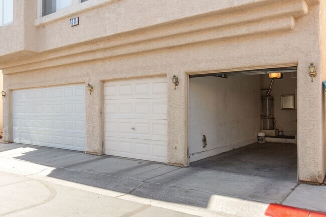 Building Photo - Two bedroom townhome with garage in gated ...