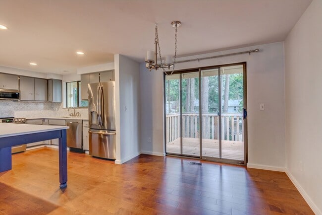 Building Photo - Spacious 4-Bedroom Home with Modern Upgrad...