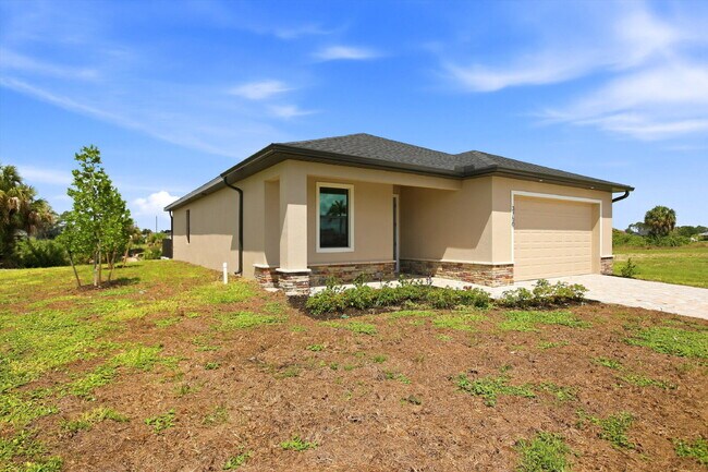 Building Photo - New 3/2 Pool Home for Rent on Canal, Fenced Yard, Pets Welcome. Your Dog Approves of This Backyard
