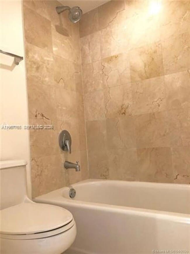 Building Photo - 6917 Collins Ave