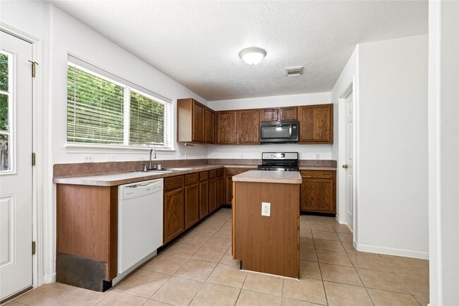 Building Photo - 5019 Woodland Meadows Ln