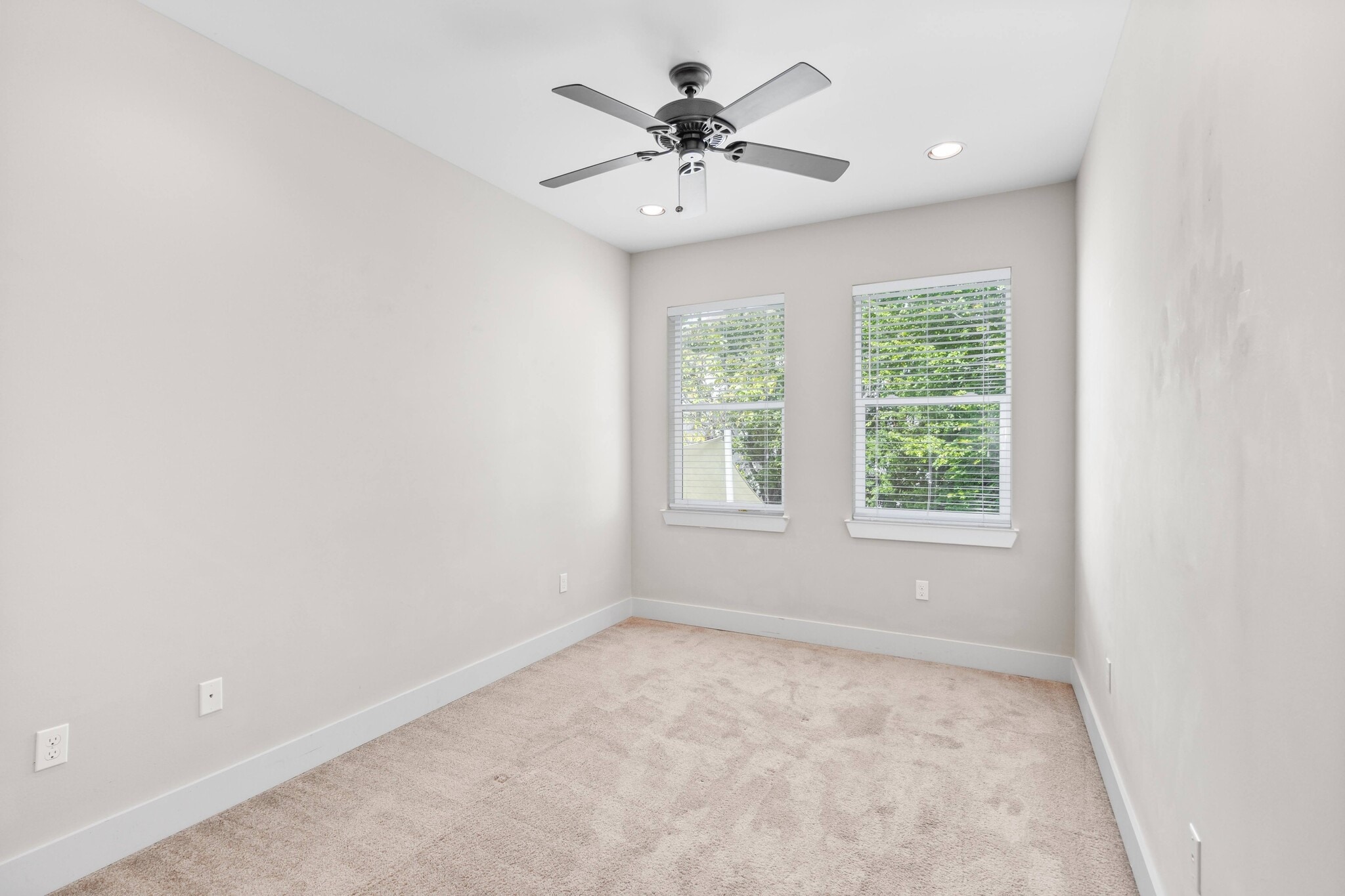 The secondary bedrooms each have 2 large windows on one wall and can fit a large bed - 1221 W 23rd St