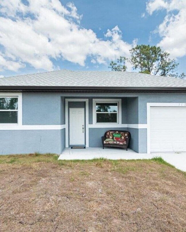 Primary Photo - Great Location in Lehigh Acres, 3/2/1 in G...