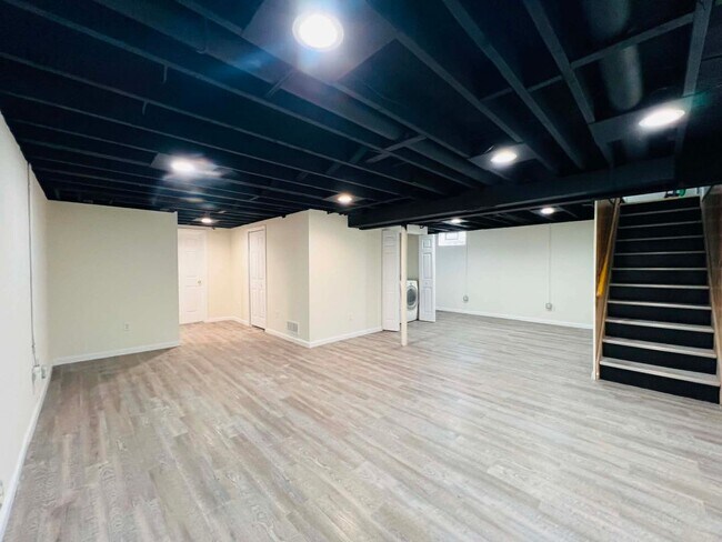 Building Photo - Spacious 4-Bedroom Home with Finished Basement & Attached Garage