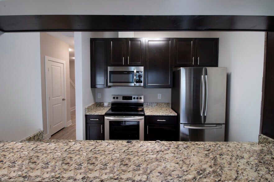 kitchen view from dining area - 230 Signature Pl
