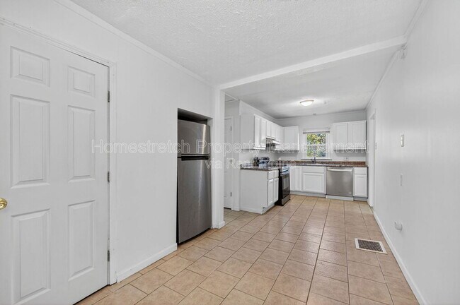 Building Photo - 6166 Emerald Ave