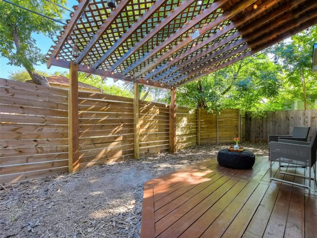 Back deck and fenced in yard - 2203 E 14th St