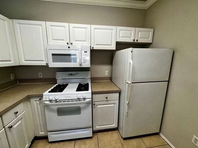 Building Photo - Spacious 2 Bed / 2 Bath Second-Floor Condo at Grand Reserve at Kirkman Park