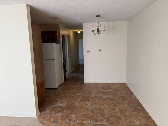 Building Photo - 6009 Quail Ridge