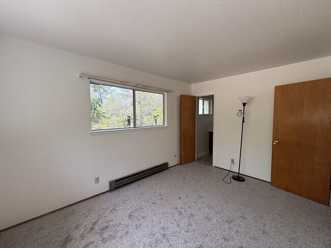 Building Photo - A gardener's delight! 3-bedroom home nestled in the countryside but close to town.