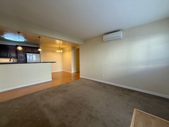 Building Photo - Upgraded Condo with Private Patio, AC, Pool, Gym, and Covered Parking in Gated Community